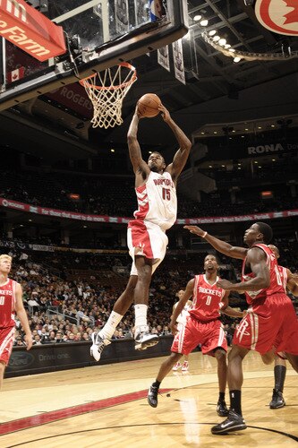 TORONTO - OCTOBER 15:  Amir Johnson #15 of the Toronto Raptors throws down the dunk during a game against the Houston Rockets on October 15, 2009 at the Air Canada Centre in Toronto, Ontario, Canada.  <br /><br /><span class="help">(Photo by Ron Turenne/NBAE via Getty Images)</span>