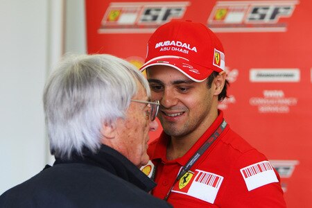 SAO PAULO, BRAZIL - OCTOBER 16:  Felipe Massa of Brazil and Ferrari returns to F1 for the first time since his accident in Hungary and greets F1 supremo Bernie Ecclestone in the paddock before practice for the Brazilian Formula One Grand Prix at the Interlagos Circuit on October 16, 2009 in Sao Paulo, Brazil.  <br /><br /><span class="help">(Photo by Mark Thompson/Getty Images)</span>