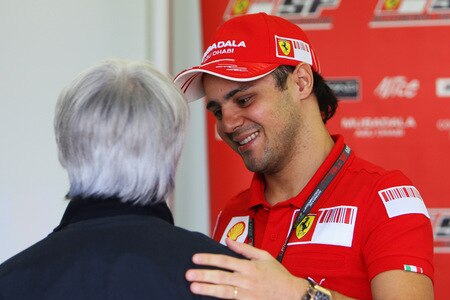 SAO PAULO, BRAZIL - OCTOBER 16:  Felipe Massa of Brazil and Ferrari returns to F1 for the first time since his accident in Hungary and greets F1 supremo Bernie Ecclestone in the paddock before practice for the Brazilian Formula One Grand Prix at the Interlagos Circuit on October 16, 2009 in Sao Paulo, Brazil.  <br /><br /><span class="help">(Photo by Mark Thompson/Getty Images)</span>