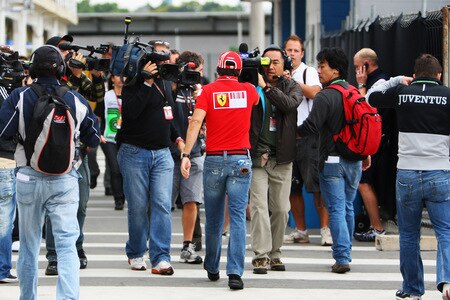 SAO PAULO, BRAZIL - OCTOBER 16:  Felipe Massa of Brazil and Ferrari is surrounded by the media as returns to F1 for the first time since his accident in Hungary before practice for the Brazilian Formula One Grand Prix at the Interlagos Circuit on October 16, 2009 in Sao Paulo, Brazil.  <br /><br /><span class="help">(Photo by Mark Thompson/Getty Images)</span>