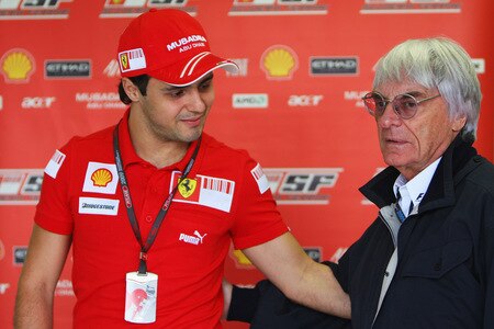 SAO PAULO, BRAZIL - OCTOBER 16:  Felipe Massa of Brazil and Ferrari returns to F1 for the first time since his accident in Hungary and greets F1 supremo Bernie Ecclestone in the paddock before practice for the Brazilian Formula One Grand Prix at the Interlagos Circuit on October 16, 2009 in Sao Paulo, Brazil.  <br /><br /><span class="help">(Photo by Mark Thompson/Getty Images)</span>