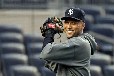NEW YORK, NY - OCTOBER 16:  Derek Jeter #2 of the New York Yankees smiles while warming up before the game against the Los Angeles Angels of Anaheim in Game One of the ALCS during the 2009 MLB Playoffs at Yankee Stadium on October 16, 2009 in New York, New York.  <br /><br /><span class="help">(Photo by Nick Laham/Getty Images)</span>