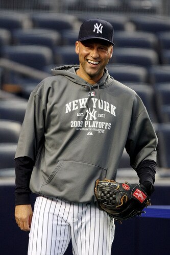 NEW YORK, NY - OCTOBER 16:  Derek Jeter #2 of the New York Yankees smiles while warming up before the game against the Los Angeles Angels of Anaheim in Game One of the ALCS during the 2009 MLB Playoffs at Yankee Stadium on October 16, 2009 in New York, New York.  <br /><br /><span class="help">(Photo by Nick Laham/Getty Images)</span>