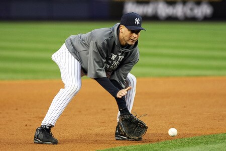 NEW YORK, NY - OCTOBER 16:  Derek Jeter #2 of the New York Yankees fields a ball while warming up before playing against the Los Angeles Angels of Anaheim in Game One of the ALCS during the 2009 MLB Playoffs at Yankee Stadium on October 16, 2009 in New York, New York.  <br /><br /><span class="help">(Photo by Nick Laham/Getty Images)</span>