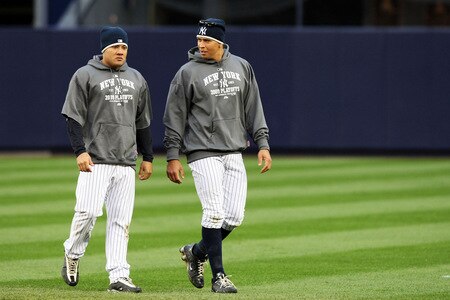 NEW YORK, NY - OCTOBER 16:  (L-R) Melky Cabrera #53 and Alex Rodriguez #13 of the New York Yankees talk during warms ups before playing against of the Los Angeles Angels of Anaheim in Game One of the ALCS during the 2009 MLB Playoffs at Yankee Stadium on October 16, 2009 in New York, New York.  <br /><br /><span class="help">(Photo by Nick Laham/Getty Images)</span>