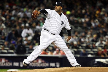 NEW YORK - OCTOBER 16:  CC Sabathia #52 of the New York Yankees pitches against the Los Angeles Angels of Anaheim in Game One of the ALCS during the 2009 MLB Playoffs at Yankee Stadium on October 16, 2009 in New York, New York.  <br /><br /><span class="help">(Photo by Jim McIsaac/Getty Images)</span>