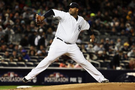 NEW YORK - OCTOBER 16:  CC Sabathia #52 of the New York Yankees pitches against the Los Angeles Angels of Anaheim in Game One of the ALCS during the 2009 MLB Playoffs at Yankee Stadium on October 16, 2009 in New York, New York.  <br /><br /><span class="help">(Photo by Jim McIsaac/Getty Images)</span>