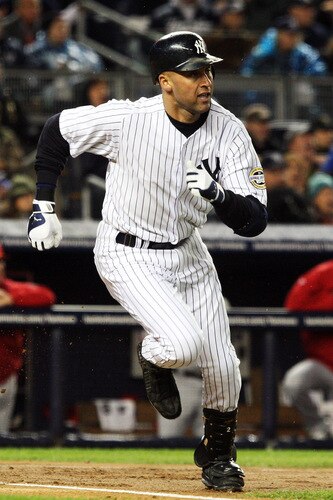 NEW YORK - OCTOBER 16:  Derek Jeter #2 of the New York Yankees runs to first base in the first inning against of the Los Angeles Angels of Anaheim in Game One of the ALCS during the 2009 MLB Playoffs at Yankee Stadium on October 16, 2009 in New York, New York.  <br /><br /><span class="help">(Photo by Jim McIsaac/Getty Images)</span>