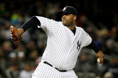 NEW YORK - OCTOBER 16:  CC Sabathia #52 of the New York Yankees pitches against the Los Angeles Angels of Anaheim in Game One of the ALCS during the 2009 MLB Playoffs at Yankee Stadium on October 16, 2009 in New York, New York.  <br /><br /><span class="help">(Photo by Jim McIsaac/Getty Images)</span>