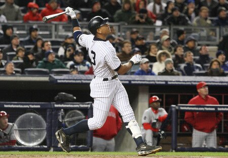 NEW YORK - OCTOBER 16:  Alex Rodriguez #13 of the New York Yankees hits a sacrifice fly to center field driving in Derek Jeter #2 in the first inning against of the Los Angeles Angels of Anaheim in Game One of the ALCS during the 2009 MLB Playoffs at Yankee Stadium on October 16, 2009 in New York, New York.  <br /><br /><span class="help">(Photo by Jim McIsaac/Getty Images)</span>