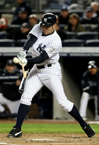 NEW YORK - OCTOBER 16:  Johnny Damon #18 of the New York Yankees breaks his bat while hitting a double in the first inning against of the Los Angeles Angels of Anaheim in Game One of the ALCS during the 2009 MLB Playoffs at Yankee Stadium on October 16, 2009 in New York, New York.  <br /><br /><span class="help">(Photo by Al Bello/Getty Images)</span>