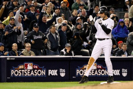 NEW YORK - OCTOBER 16:  Derek Jeter #2 of the New York Yankees claps while on first base in the first inning against of the Los Angeles Angels of Anaheim in Game One of the ALCS during the 2009 MLB Playoffs at Yankee Stadium on October 16, 2009 in New York, New York.  <br /><br /><span class="help">(Photo by Jim McIsaac/Getty Images)</span>