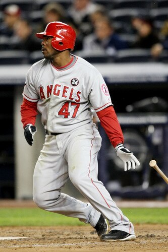 NEW YORK - OCTOBER 16:  Howie Kendrick #47 of the Los Angeles Angels of Anaheim hits a single to centerfield in the second inning against the New York Yankees against in Game One of the ALCS during the 2009 MLB Playoffs at Yankee Stadium on October 16, 2009 in New York, New York.  <br /><br /><span class="help">(Photo by Al Bello/Getty Images)</span>