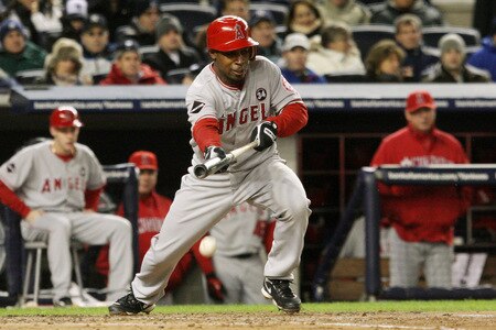 NEW YORK - OCTOBER 16:  Chone Figgins #9 of the Los Angeles Angels of Anaheim hits a foul bunt in the third inning against the New York Yankees in Game One of the ALCS during the 2009 MLB Playoffs at Yankee Stadium on October 16, 2009 in New York, New York.  <br /><br /><span class="help">(Photo by Jim McIsaac/Getty Images)</span>
