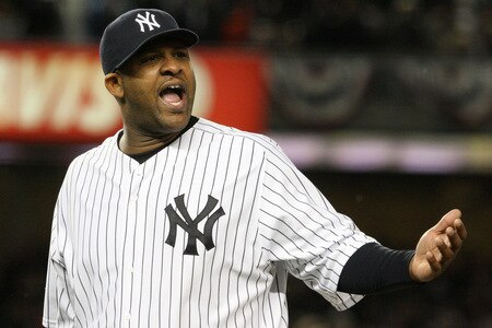 NEW YORK - OCTOBER 16:  CC Sabathia #52 of the New York Yankees reacts as he walks off the mound in the first inning of Game One of the ALCS during the 2009 MLB Playoffs against the Los Angeles Angels of Anaheim at Yankee Stadium on October 16, 2009 in New York, New York.  <br /><br /><span class="help">(Photo by Jim McIsaac/Getty Images)</span>
