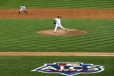 NEW YORK - OCTOBER 16:  CC Sabathia #52 of the New York Yankees pitches against the Los Angeles Angels of Anaheim in the first inning of Game One of the ALCS during the 2009 MLB Playoffs at Yankee Stadium on October 16, 2009 in New York, New York.  <br /><br /><span class="help">(Photo by Nick Laham/Getty Images)</span>