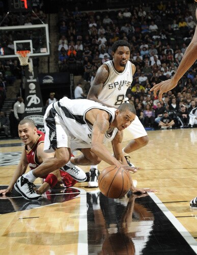 SAN ANTONIO - OCTOBER 16: George Hill #3 of the San Antonio Spurs fights for the ball in the game against the Cleveland Cavaliers on October 16, 2009 at the AT&T Center in San Antonio, Texas. <br /><br /><span class="help">(Photo by D. Clarke Evans/NBAE via Getty Images)</span>