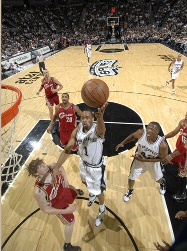 SAN ANTONIO - OCTOBER 16: Malik Hairston #1 of the San Antonio Spurs shoots over Coby Karl #5 of the Cleveland Cavaliers on October 16, 2009 at the AT&T Center in San Antonio, Texas. <br /><br /><span class="help">(Photo by D. Clarke Evans/NBAE via Getty Images)</span>