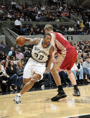 SAN ANTONIO - OCTOBER 16: Marcus Haislip #22 of the San Antonio Spurs drives past Luke Nevill #50 of the Cleveland Cavaliers on October 16, 2009 at the AT&T Center in San Antonio, Texas. <br /><br /><span class="help">(Photo by D. Clarke Evans/NBAE via Getty Images)</span>