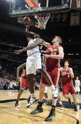 SAN ANTONIO - OCTOBER 16: DeJuan Blair #45 of the San Antonio Spurs rebounds against Luke Nevill #50 of the Cleveland Cavaliers on October 16, 2009 at the AT&T Center in San Antonio, Texas. <br /><br /><span class="help">(Photo by D. Clarke Evans/NBAE via Getty Images)</span>