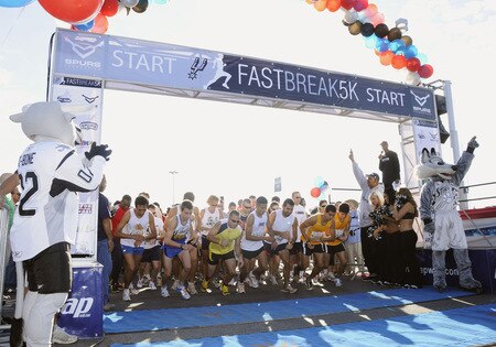 SAN ANTONIO - OCTOBER 17: NBA Hall of Famer George Gervin, with starter pistol, signals the start of the San Antonio Spurs Fast Break 5K on October 17, 2009 in San Antonio, Texas. <br /><br /><span class="help">(Photo by D. Clarke Evans/NBAE via Getty Images)</span>