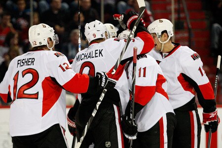 MONTREAL- OCTOBER 17:  Members of the Ottawa Senators celebrate the second period goal by Daniel Alfredsson #11 during the NHL game against the Montreal Canadiens on October 17, 2009 at the Bell Centre in Montreal, Quebec, Canada.  <br /><br /><span class="help">(Photo by Richard Wolowicz/Getty Images)</span>