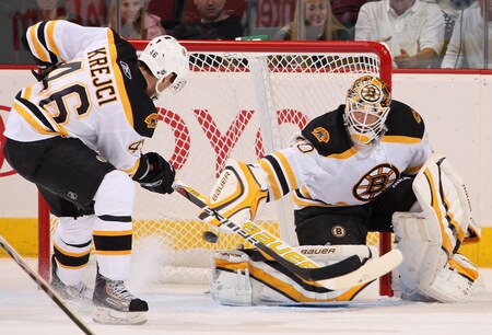 GLENDALE, AZ - OCTOBER 17:  Goaltender Tim Thomas #30 of the Boston Bruins makes a pad save on the shot from the Phoenix Coyotes during the NHL game at Jobing.com Arena on October 17, 2009 in Glendale, Arizona.  <br /><br /><span class="help">(Photo by Christian Petersen/Getty Images)</span>