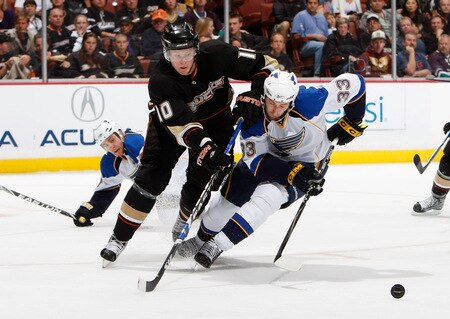 ANAHEIM, CA - OCTOBER 17:  Corey Perry #10 of the Anaheim Ducks and Tyson Strachan #33 of the St. Louis Blues battle for the puck in the first period at Honda Center on October 17, 2009 in Anaheim, California.  <br /><br /><span class="help">(Photo by Jeff Gross/Getty Images)</span>