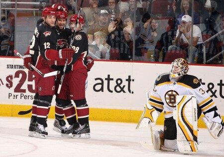 GLENDALE, AZ - OCTOBER 17:  Adrian Aucoin #33 of the Phoenix Coyotes is congratulated by teammates 	Paul Bissonnette #12 and Vernon Fiddler #38 after Aucoin scored a second period goal past goaltender Tim Thomas #30 of the Boston Bruins during the NHL game at Jobing.com Arena on October 17, 2009 in Glendale, Arizona.  The Coyotes defeated the Bruins 4-1. <br /><br /><span class="help">(Photo by Christian Petersen/Getty Images)</span>