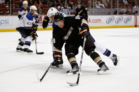 ANAHEIM, CA - OCTOBER 17:  Bobby Ryan #9 of the Anaheim Ducks skates around Tyson Strachan #33 of the St. Louis Blues with the puck in the third period at Honda Center on October 17, 2009 in Anaheim, California. The Blues defeated the Ducks 5-0.  <br /><br /><span class="help">(Photo by Jeff Gross/Getty Images)</span>