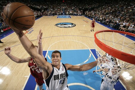 DALLAS - OCTOBER 17: Kris Humphries #43 of the Dallas Mavericks goes up for the rebound against the Cleveland Cavaliers during a preseason game at the American Airlines Center on October 17, 2009 in Dallas, Texas. <br /><br /><span class="help">(Photo by Glenn James/NBAE via Getty Images)</span>