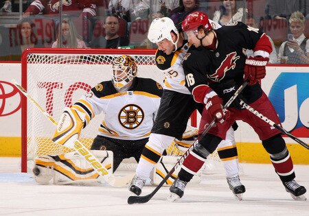 GLENDALE, AZ - OCTOBER 17:  Goaltender Tim Thomas #30 of the Boston Bruins makes a pad save on the shot from the Phoenix Coyotes as Johnny Boychuk #55 defends against Petr Prucha #16 during the NHL game at Jobing.com Arena on October 17, 2009 in Glendale, Arizona.  The Coyotes defeated the Bruins 4-1. <br /><br /><span class="help">(Photo by Christian Petersen/Getty Images)</span>