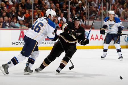 ANAHEIM, CA - OCTOBER 17:  Corey Perry #10 of the Anaheim Ducks and Roman Polak #46 of the St. Louis Blues battle for the puck in the first period at Honda Center on October 17, 2009 in Anaheim, California. The Blues defeated the Ducks 5-0.  <br /><br /><span class="help">(Photo by Jeff Gross/Getty Images)</span>