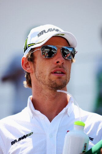 SAO PAULO, BRAZIL - OCTOBER 18:  Jenson Button of Great Britain and Brawn GP attends the drivers parade before the Brazilian Formula One Grand Prix at the Interlagos Circuit on October 18, 2009 in Sao Paulo, Brazil.  <br /><br /><span class="help">(Photo by Mark Thompson/Getty Images)</span>