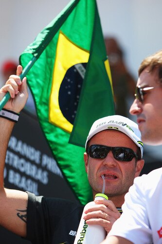 SAO PAULO, BRAZIL - OCTOBER 18:  Rubens Barrichello of Brazil and Brawn GP attends the drivers parade before the Brazilian Formula One Grand Prix at the Interlagos Circuit on October 18, 2009 in Sao Paulo, Brazil.  <br /><br /><span class="help">(Photo by Mark Thompson/Getty Images)</span>