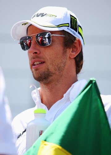 SAO PAULO, BRAZIL - OCTOBER 18:  Jenson Button of Great Britain and Brawn GP attends the drivers parade before the Brazilian Formula One Grand Prix at the Interlagos Circuit on October 18, 2009 in Sao Paulo, Brazil.  <br /><br /><span class="help">(Photo by Mark Thompson/Getty Images)</span>