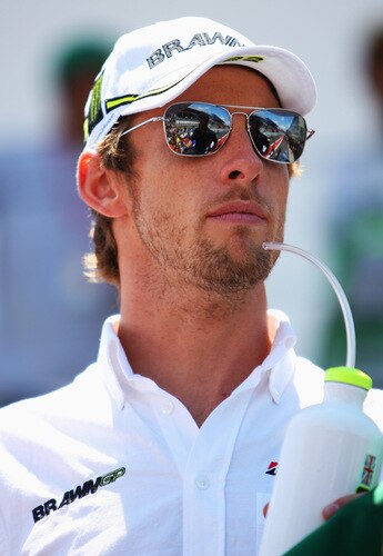 SAO PAULO, BRAZIL - OCTOBER 18:  Jenson Button of Great Britain and Brawn GP attends the drivers parade before the Brazilian Formula One Grand Prix at the Interlagos Circuit on October 18, 2009 in Sao Paulo, Brazil.  <br /><br /><span class="help">(Photo by Mark Thompson/Getty Images)</span>