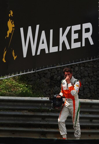 SAO PAULO, BRAZIL - OCTOBER 18:  Adrian Sutil of Germany and Force India walks back to the pits after retiring early during the Brazilian Formula One Grand Prix at the Interlagos Circuit on October 18, 2009 in Sao Paulo, Brazil.  <br /><br /><span class="help">(Photo by Mark Thompson/Getty Images)</span>