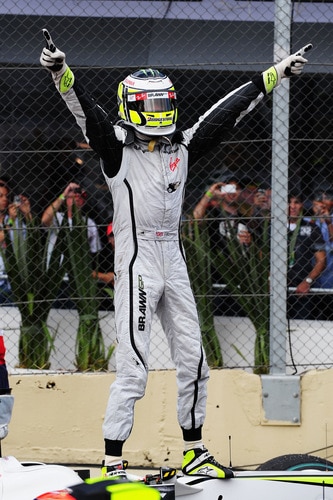 SAO PAULO, BRAZIL - OCTOBER 18:  Jenson Button of Great Britain and Brawn GP celebrates in parc ferme after clinching the F1 World Drivers Championship during the Brazilian Formula One Grand Prix at the Interlagos Circuit on October 18, 2009 in Sao Paulo, Brazil.  <br /><br /><span class="help">(Photo by Clive Mason/Getty Images)</span>