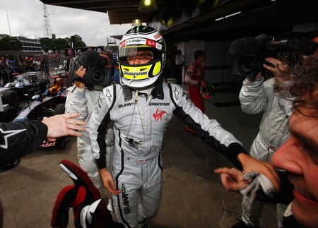 SAO PAULO, BRAZIL - OCTOBER 18:  Jenson Button of Great Britain and Brawn GP celebrates in parc ferme after clinching the F1 World Drivers Championship during the Brazilian Formula One Grand Prix at the Interlagos Circuit on October 18, 2009 in Sao Paulo, Brazil.  <br /><br /><span class="help">(Photo by Mark Thompson/Getty Images)</span>