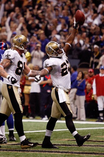 NEW ORLEANS - OCTOBER 18:  Mike Bell #21 of the New Orleans Saints celebrates after scoring a touchdown against the New York Giants at the Louisiana Superdome on October 18, 2009 in New Orleans, Louisiana.  <br /><br /><span class="help">(Photo by Chris Graythen/Getty Images)</span>