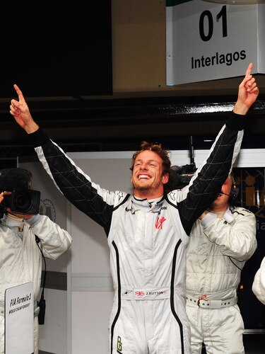 SAO PAULO, BRAZIL - OCTOBER 18:  Jenson Button of Great Britain and Brawn GP celebrates in parc ferme after clinching the F1 World Drivers Championship during the Brazilian Formula One Grand Prix at the Interlagos Circuit on October 18, 2009 in Sao Paulo, Brazil.  <br /><br /><span class="help">(Photo by Clive Mason/Getty Images)</span>
