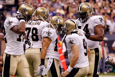 NEW ORLEANS - OCTOBER 18:  Drew Brees #9 celebrates with Lance Moore #16 of the New Orleans Saints after scoring a touchdown against the New York Giants at the Louisiana Superdome on October 18, 2009 in New Orleans, Louisiana.  <br /><br /><span class="help">(Photo by Chris Graythen/Getty Images)</span>