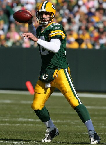 GREEN BAY, WI - OCTOBER 18: Aaron Rodgers #12 of the Green Bay Packers throws a pass against the Detroit Lions at Lambeau Field on October 18, 2009 in Green Bay, Wisconsin. <br /><br /><span class="help">(Photo by Jonathan Daniel/Getty Images)</span>