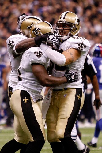 NEW ORLEANS - OCTOBER 18:  Scott Shanle #58 of the New Orleans Saints celebrates after recovering a fumble by the New York Giants at the Louisiana Superdome on October 18, 2009 in New Orleans, Louisiana.  <br /><br /><span class="help">(Photo by Chris Graythen/Getty Images)</span>