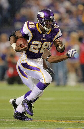 MINNEAPOLIS - OCTOBER 18:  Running back Adrian Peterson #28 of the Minnesota Vikings rushes the ball against the Baltimore Ravens during NFL action at Hubert H. Humphrey Metrodome on October 18, 2009 in Minneapolis, Minnesota.  <br /><br /><span class="help">(Photo by Doug Pensinger/Getty Images)</span>