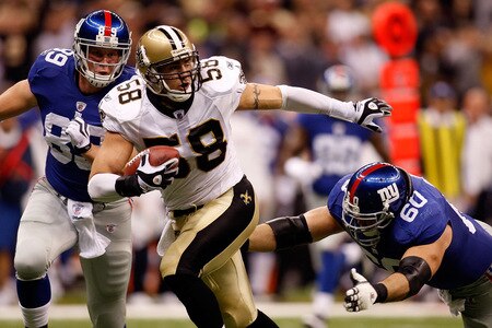 NEW ORLEANS - OCTOBER 18:  Scott Shanle #58 of the New Orleans Saints tries to avoid Shaun O'Hara #60 and  Kevin Boss #89 of the New York Giants after recovering a fumble at the Louisiana Superdome on October 18, 2009 in New Orleans, Louisiana.  <br /><br /><span class="help">(Photo by Chris Graythen/Getty Images)</span>