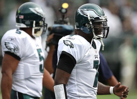 OAKLAND, CA - OCTOBER 18:  Michael Vick #7 of the Philadelphia Eagles walks off the field with teammate Donovan McNabb #5 during pre-game against the Oakland Raiders during an NFL game at the Oakland-Alameda County Coliseum on October 18, 2009 in Oakland, California.  <br /><br /><span class="help">(Photo by Jed Jacobsohn/Getty Images)</span>
