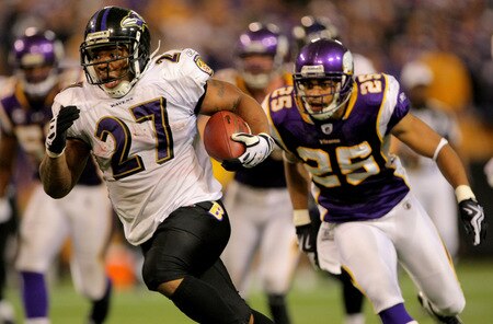 MINNEAPOLIS - OCTOBER 18:  Running back Ray Rice #27 of the Baltimore Ravens eludes Tyrell Johnson #25 of the Minnesota Vikings as he rushes 33 yards for a fourth quarter touchdown during NFL action at Hubert H. Humphrey Metrodome on October 18, 2009 in Minneapolis, Minnesota. The Vikings defeated the Ravens 33-31.  <br /><br /><span class="help">(Photo by Doug Pensinger/Getty Images)</span>