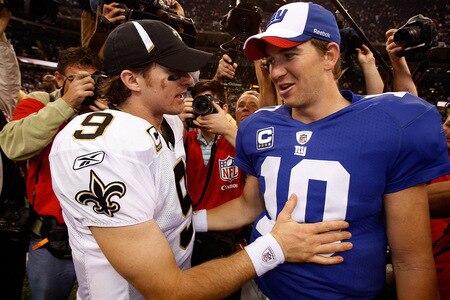 NEW ORLEANS - OCTOBER 18:  Drew Brees #9 of the New Orleans Saints is congratulated by Eli Manning #10 of the New York Giants after the Saints defeated the Giants 48-27  at the Louisiana Superdome on October 18, 2009 in New Orleans, Louisiana.  <br /><br /><span class="help">(Photo by Chris Graythen/Getty Images)</span>